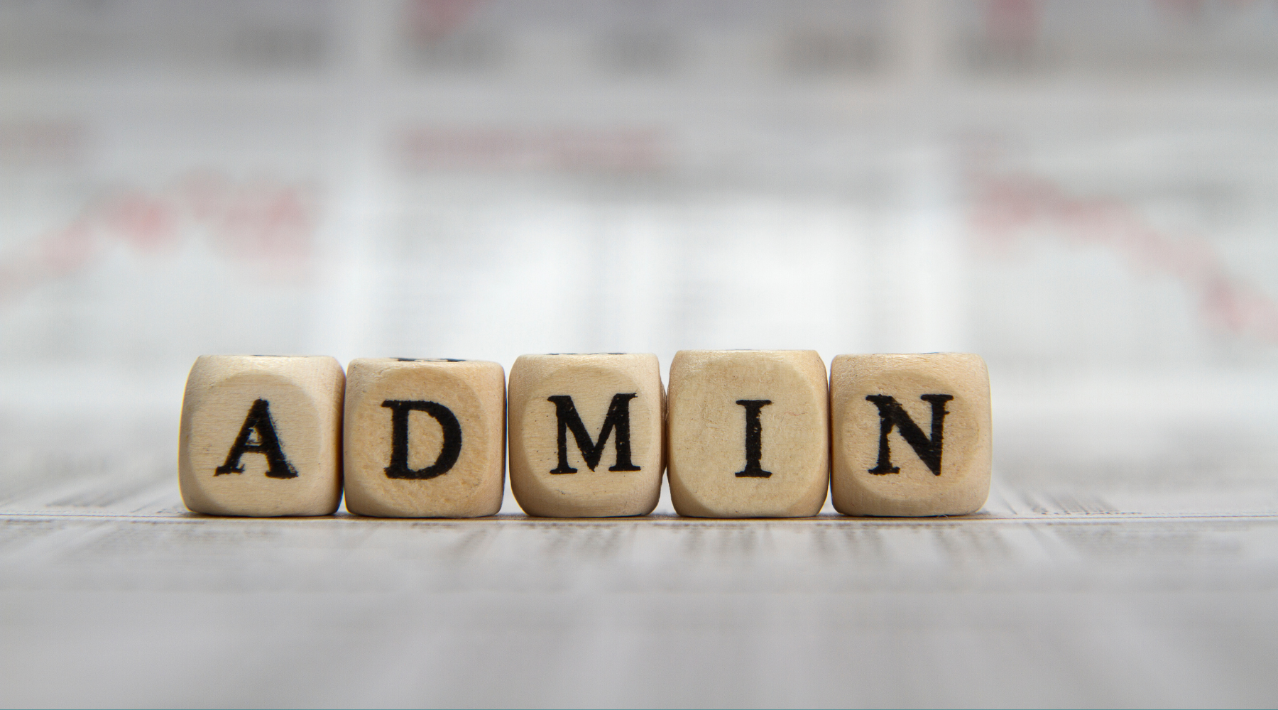 Wooden blocks spelling out the word "Admin"